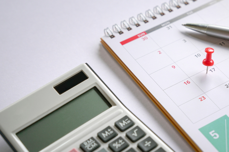 stock image of calculator and calendar