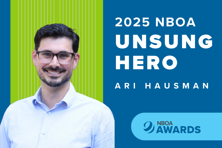 Photo of Ari Hausman against a blue and green NBOA background