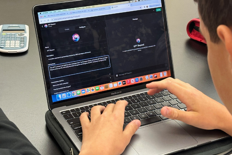 A Kinkaid School student using AI on their school laptop