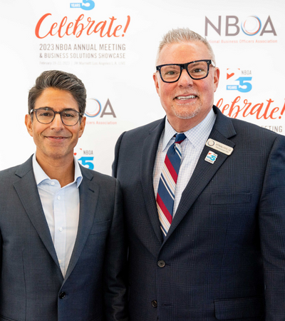 Keynote speaker Suneel Gupta, left, and NBOA President & CEO Jeff Shields, right